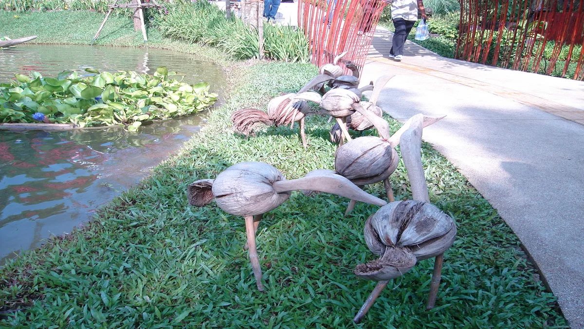 Nido de coco natural BESPORTBLE para pájaros